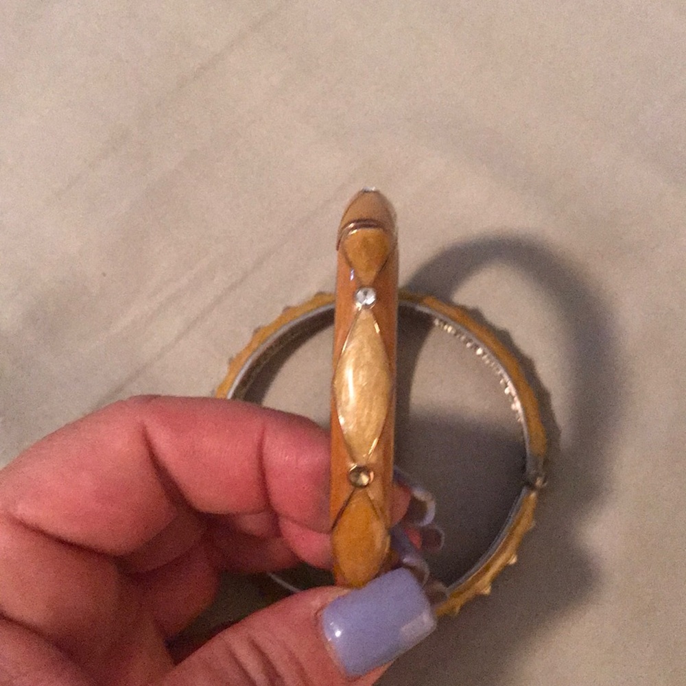 Two gold design bracelets